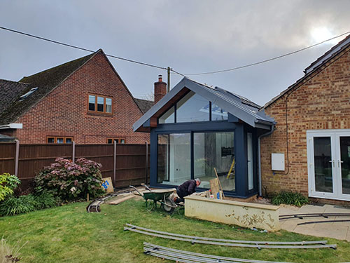 Gable roof with glazing in ZINC